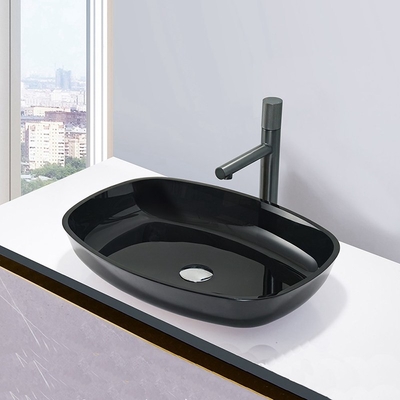 Los altos lavabos moderados negros brillantes del cuarto de baño alisan interior y exterior